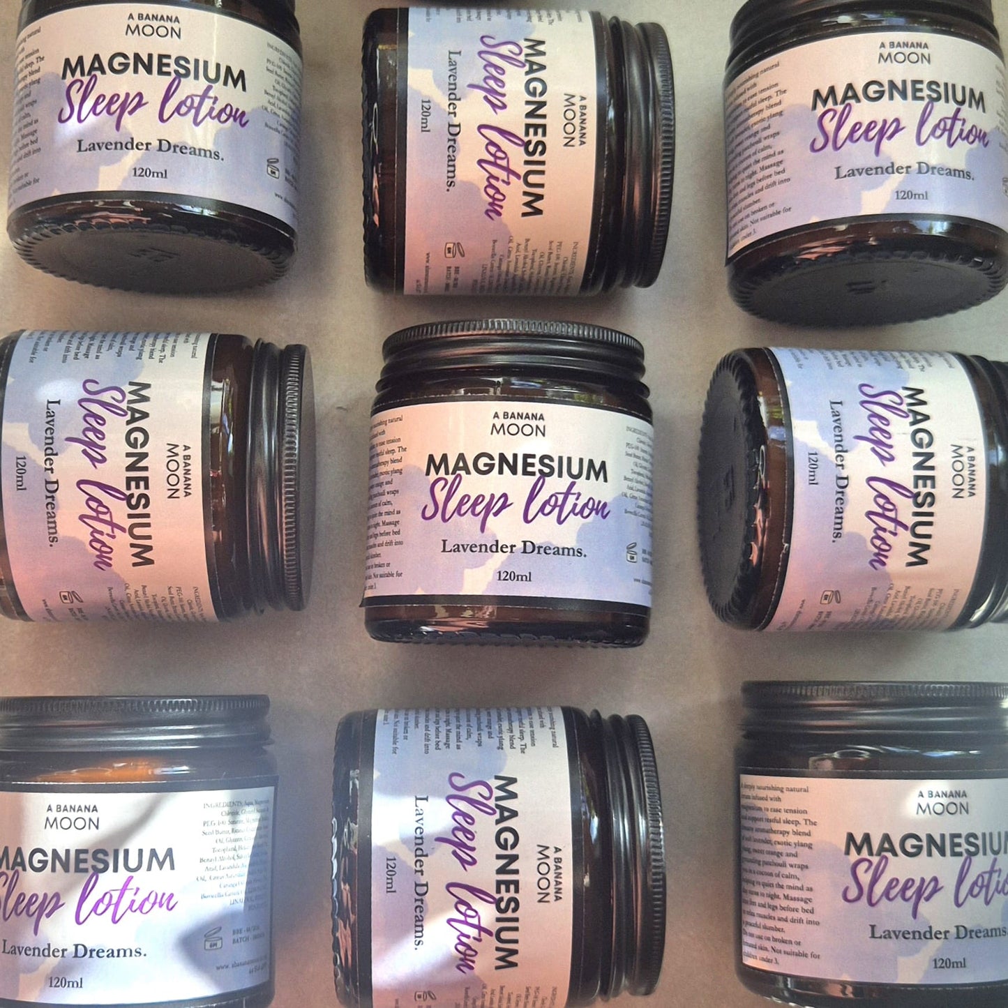 A Banana Moon Magnesium Sleep Lotion jar, lavender bedtime lotion with magnesium